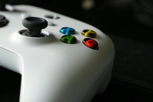 Gaming controller on desk representing handheld gaming devices
