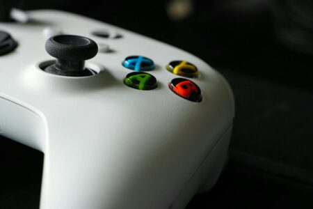 Gaming controller on desk representing handheld gaming devices
