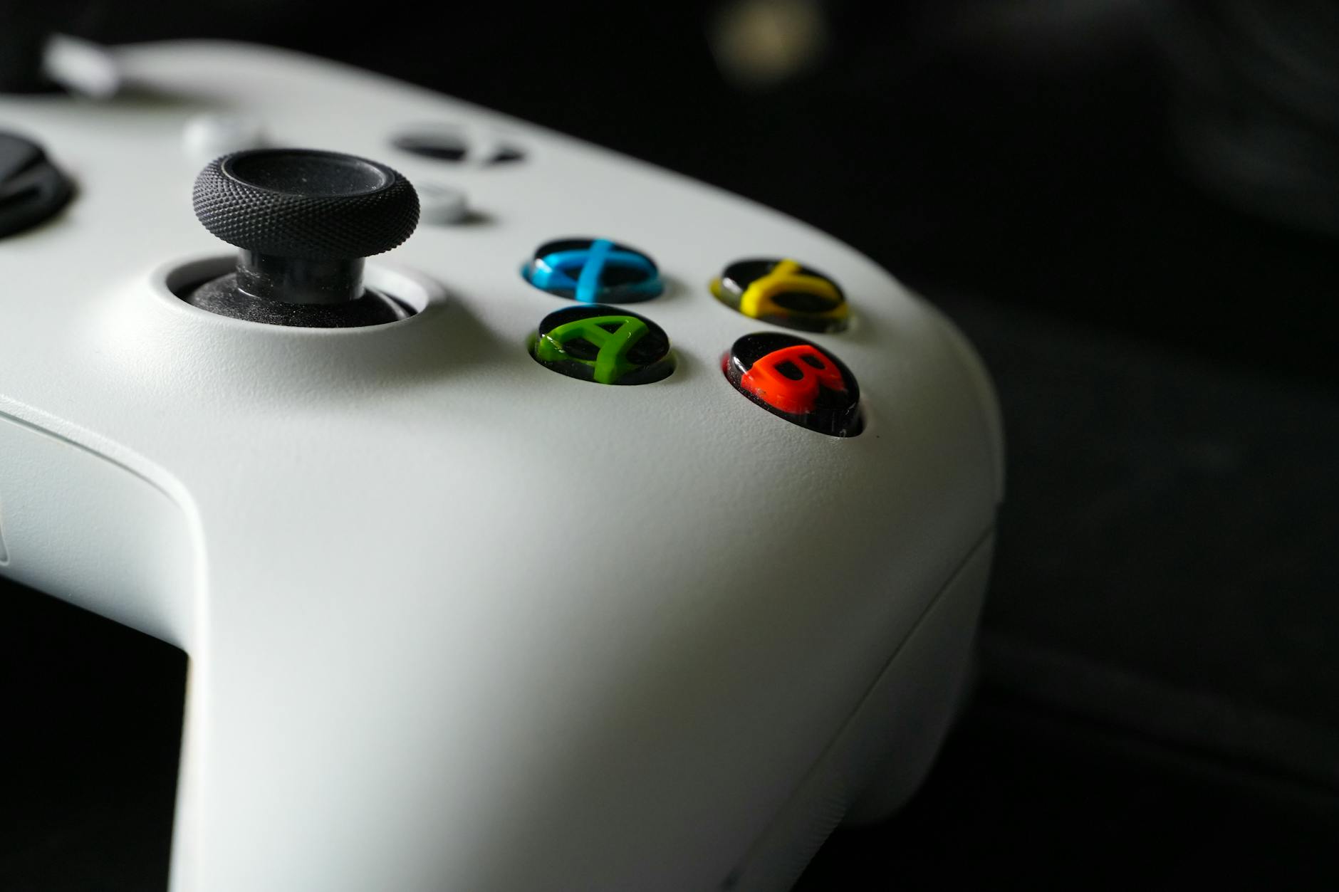 Gaming controller on desk representing handheld gaming devices