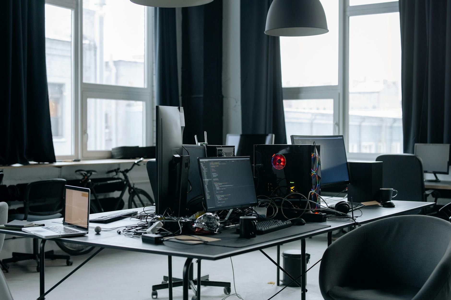 Modern office workspace with computer displaying Microsoft Office applications on screen