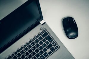 Modern laptop computer on clean desk workspace for creative professionals
