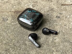 Premium wireless earbuds displayed on clean surface showing modern design