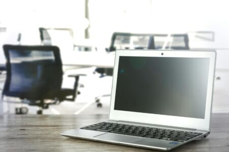 Modern laptop computer on a clean desk workspace
