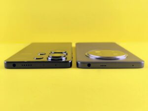 Two modern smartphones side by side showing design comparison between mid-range Android devices