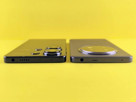 Two modern smartphones side by side showing design comparison between mid-range Android devices