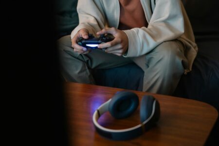 Professional wireless gaming headset with microphone on desk setup
