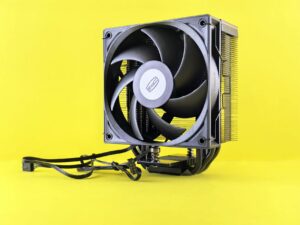 High-end computer components including CPU, GPU, and motherboard laid out for custom PC build