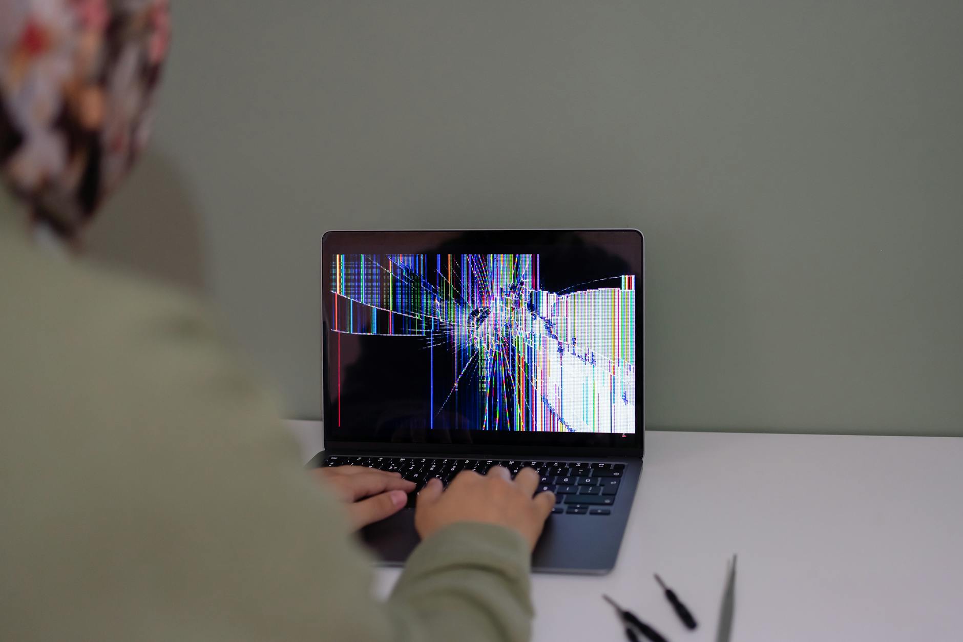 Close-up of laptop screen displaying code and AI interface for advanced ChatGPT features