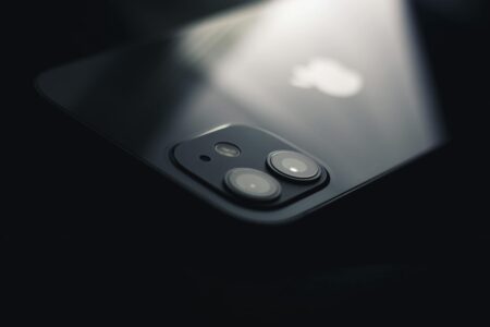 Close-up view of smartphone camera lenses showing multiple sensors and optical components