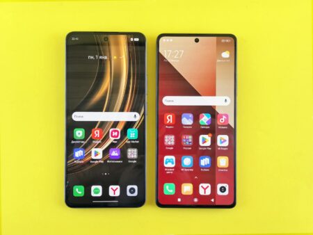 Two premium smartphones side by side on a clean white surface for comparison