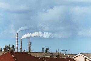 12 Best Wearable Air Purifiers with Real-Time Pollution Monitoring Urban skyline with visible air pollution and smog covering buildings
