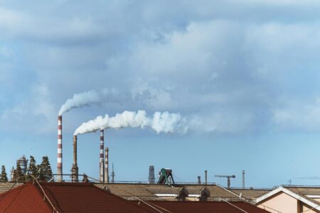 Urban skyline with visible air pollution and smog covering buildings