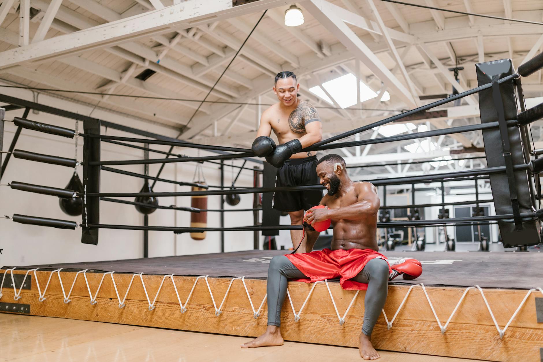 Person boxing with smart gloves and punch tracking sensors