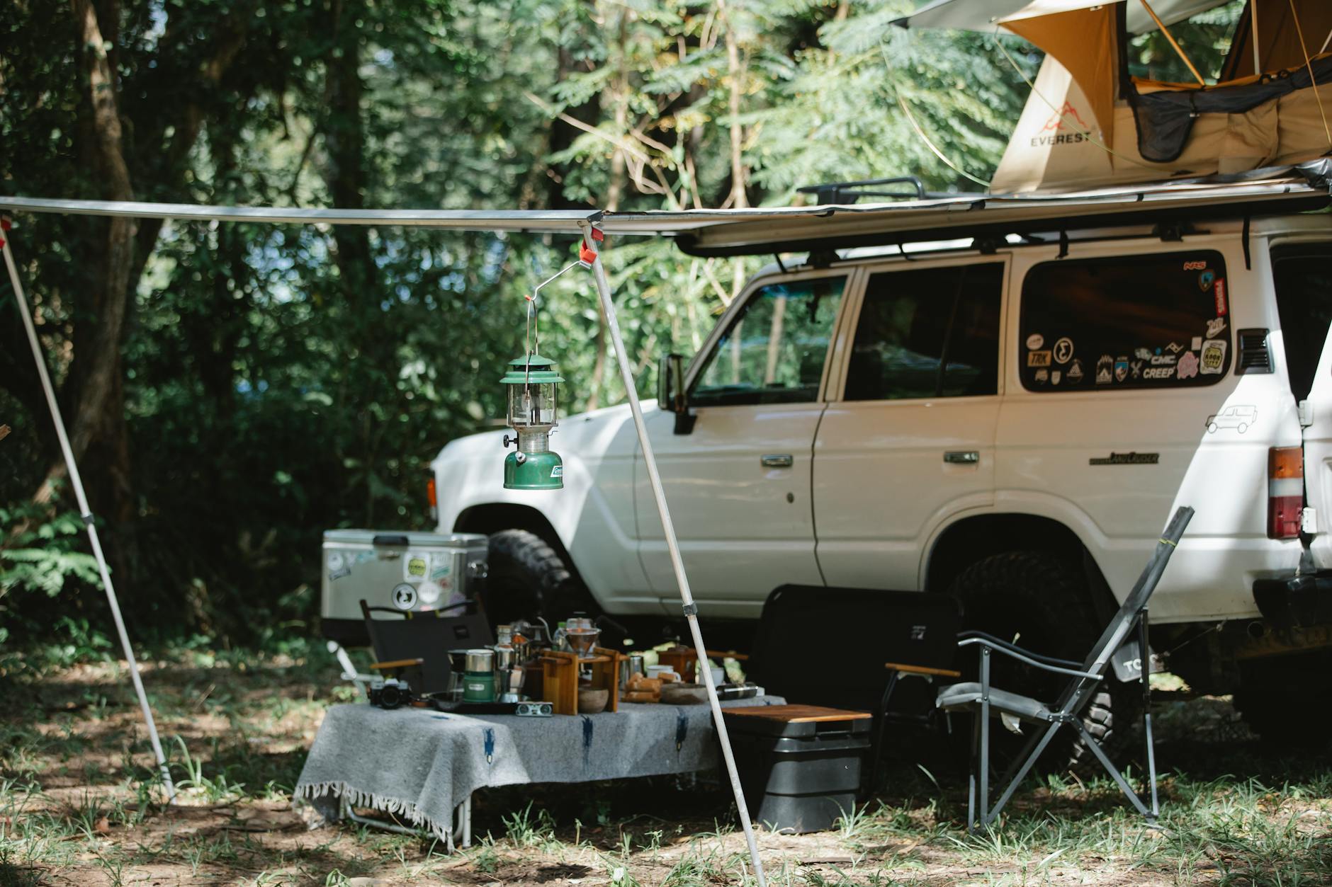 Portable power station being used at outdoor campsite