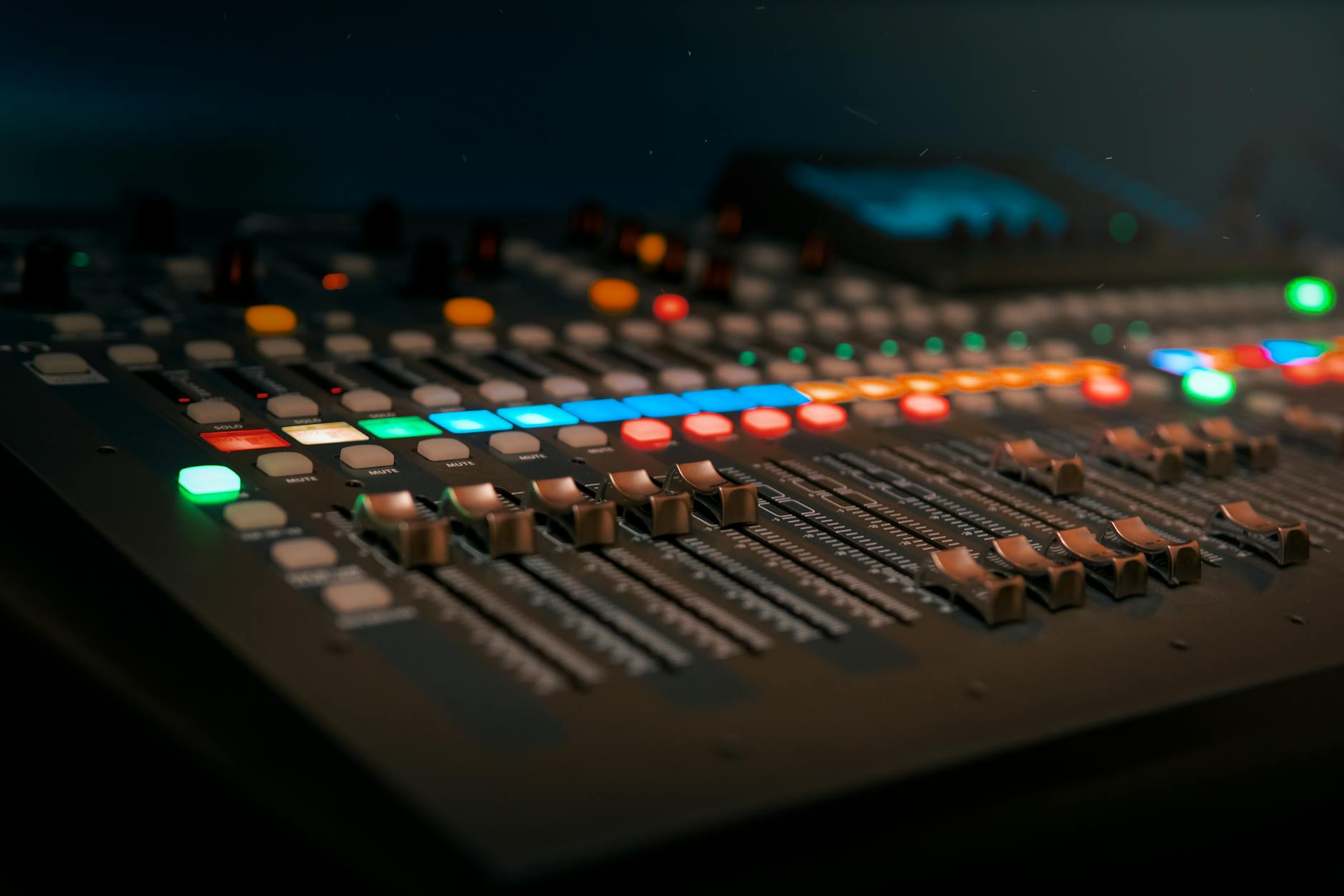 Digital audio mixing board with faders and controls for professional sound editing