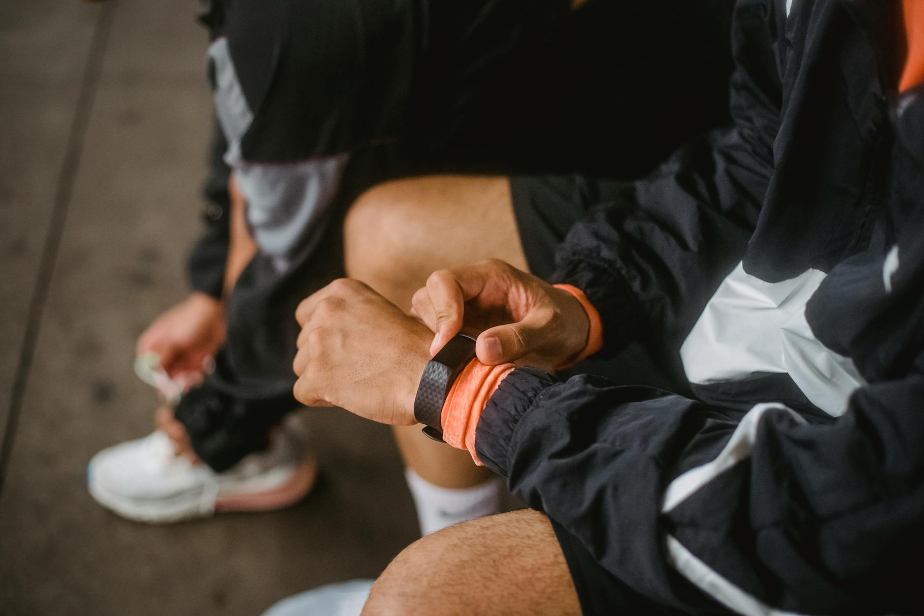 Smartphone displaying health monitoring data charts and biometric information on screen