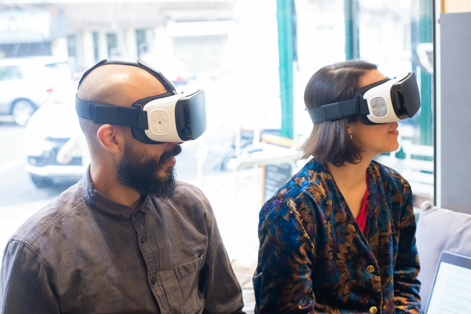 Person wearing AR glasses with digital overlay interface visible