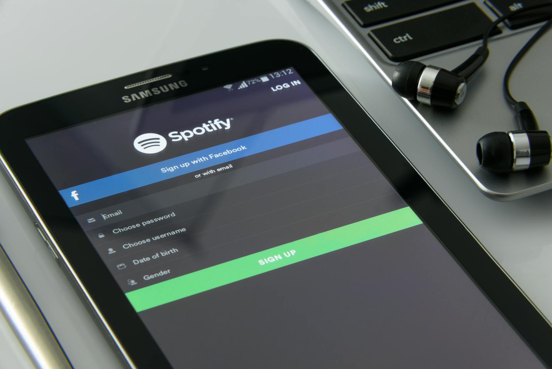 Person using a smartphone to stream video content from a media library