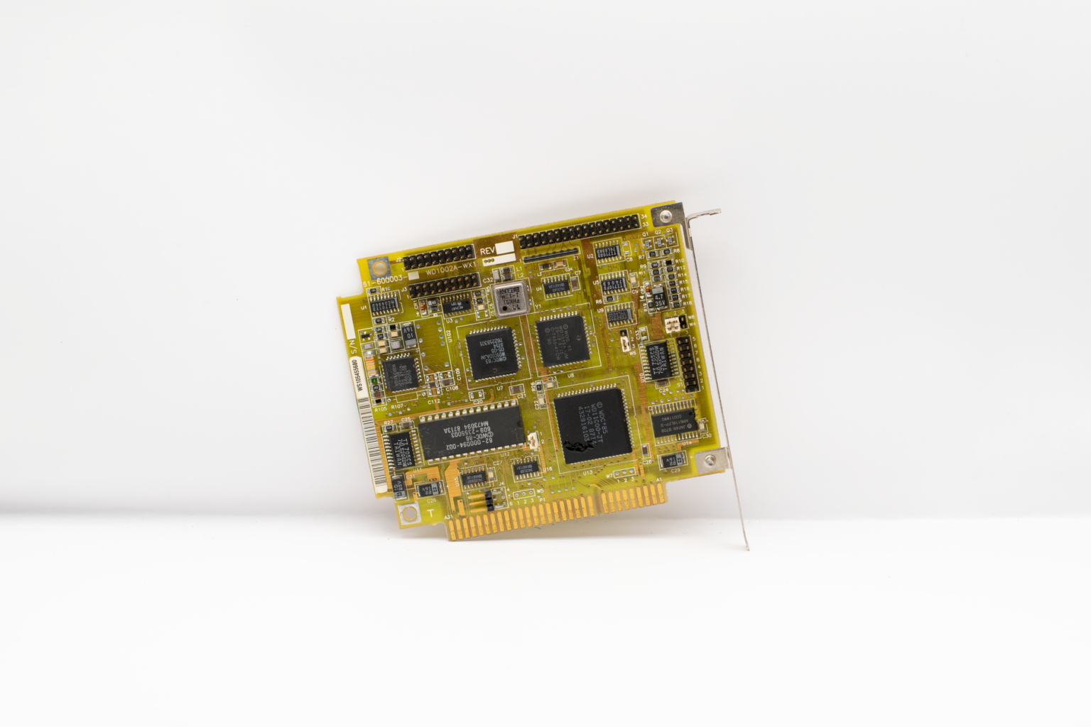Raspberry Pi 5 single-board computer on a desk without monitor or peripherals