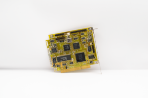 Raspberry Pi 5 single-board computer on a desk without monitor or peripherals
