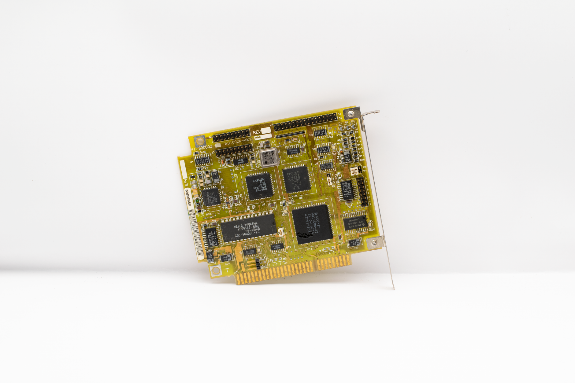 Raspberry Pi 5 single-board computer on a desk without monitor or peripherals