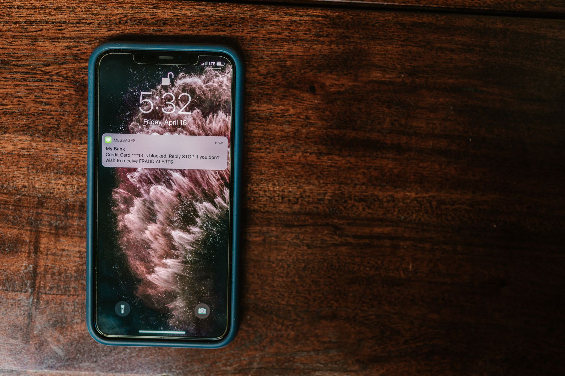 A smartphone displaying push notification alerts on its screen