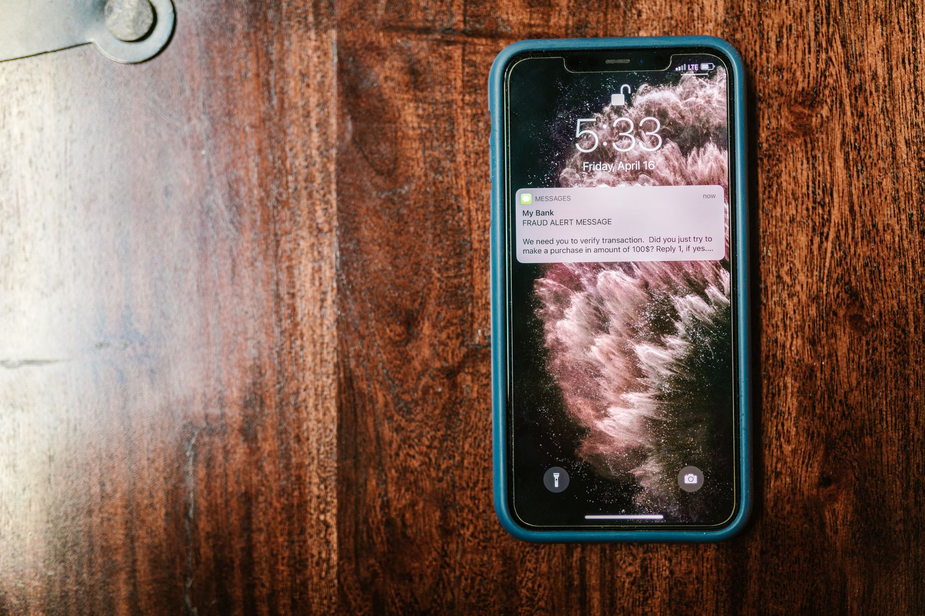A smartphone displaying a push notification on the lock screen