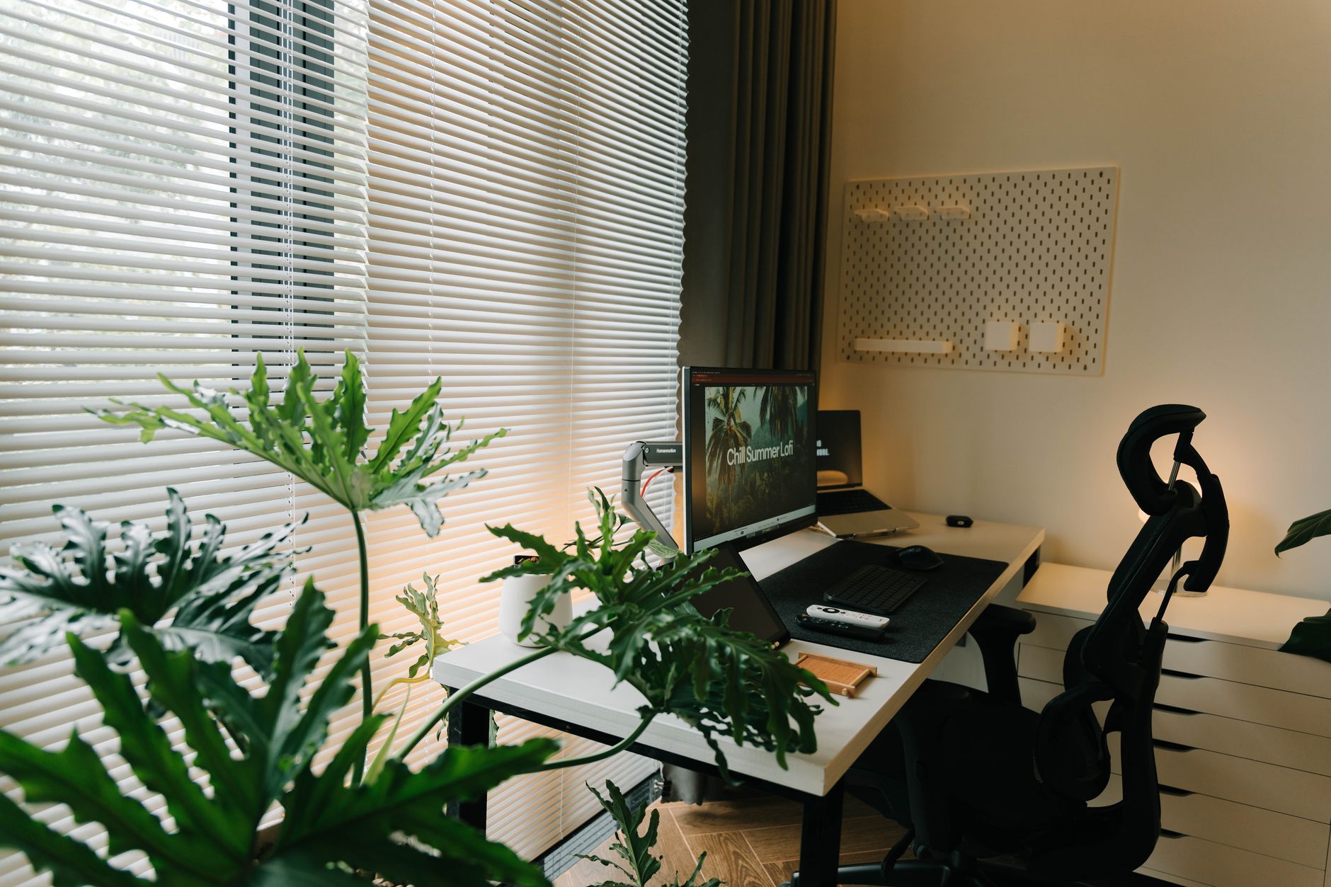 Home office computer setup used for self-hosted media server management