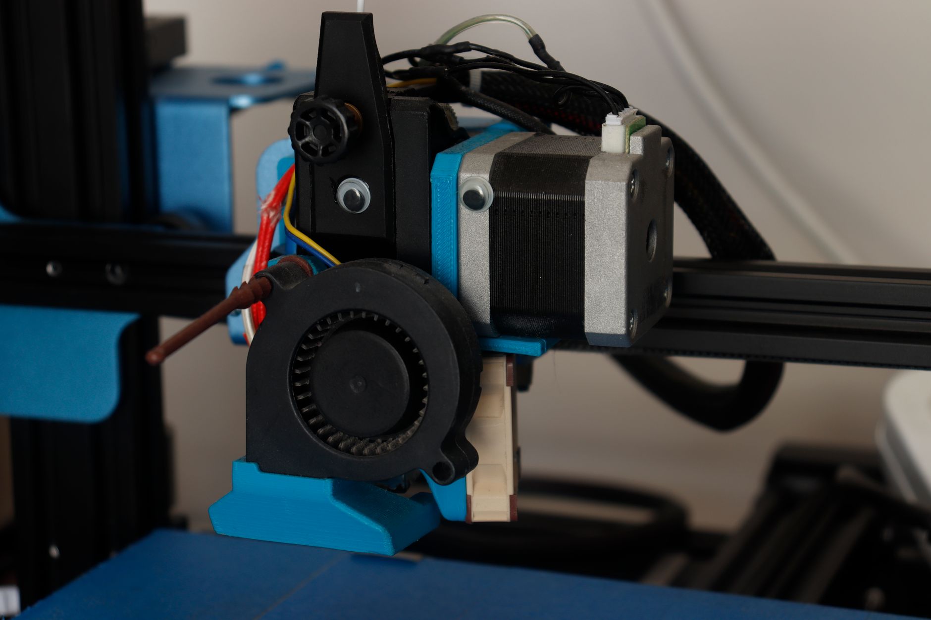 Several small 3D printed objects arranged on a flat surface
