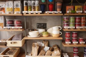 Organized pantry shelves with labeled containers and food products