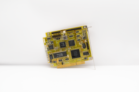 A Raspberry Pi single-board computer on a desk, ready for a server setup project