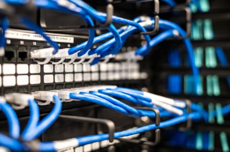 A compact home server setup on a desk representing self-hosted infrastructure