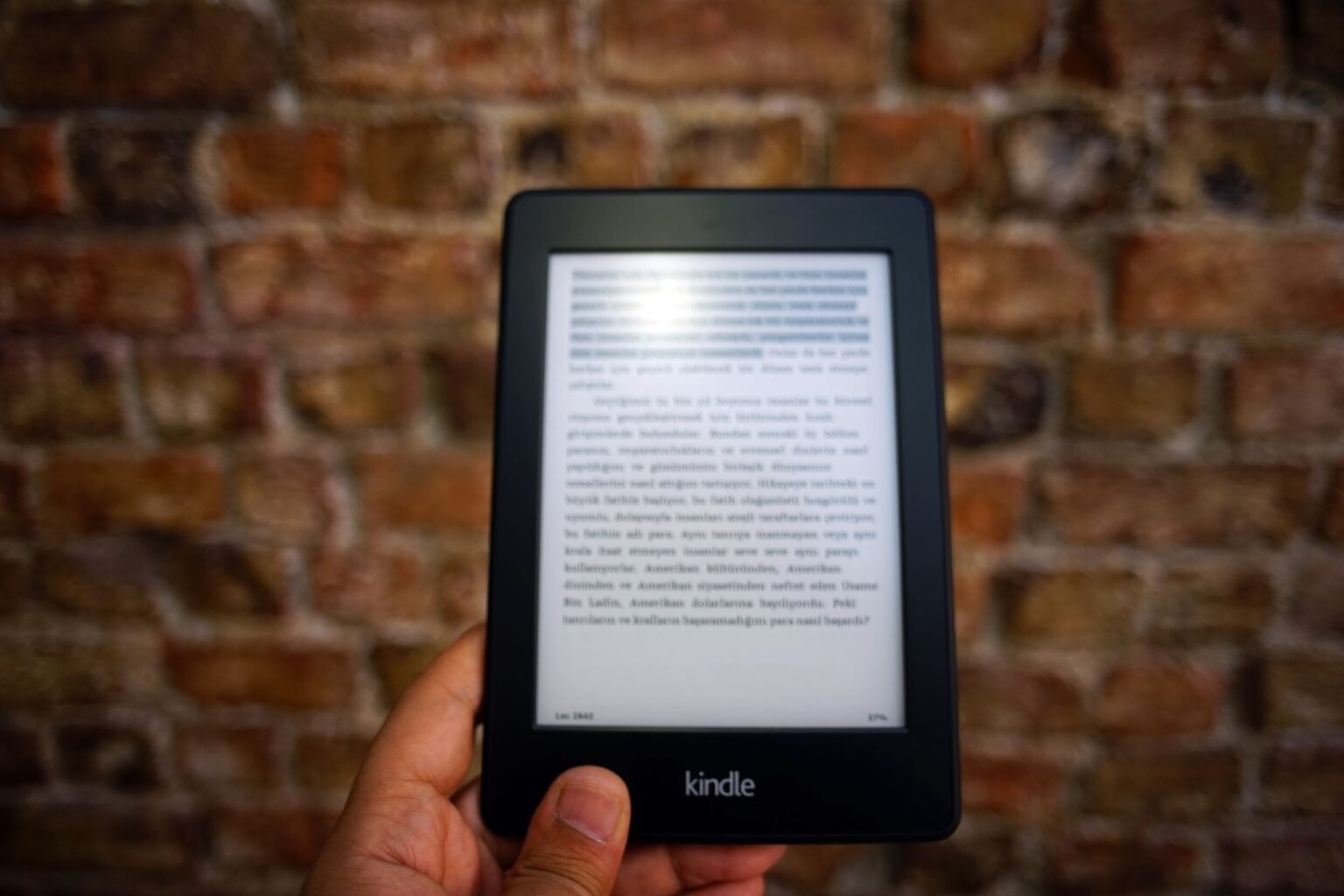 Digital ebook library displayed on a tablet screen with shelves of book covers