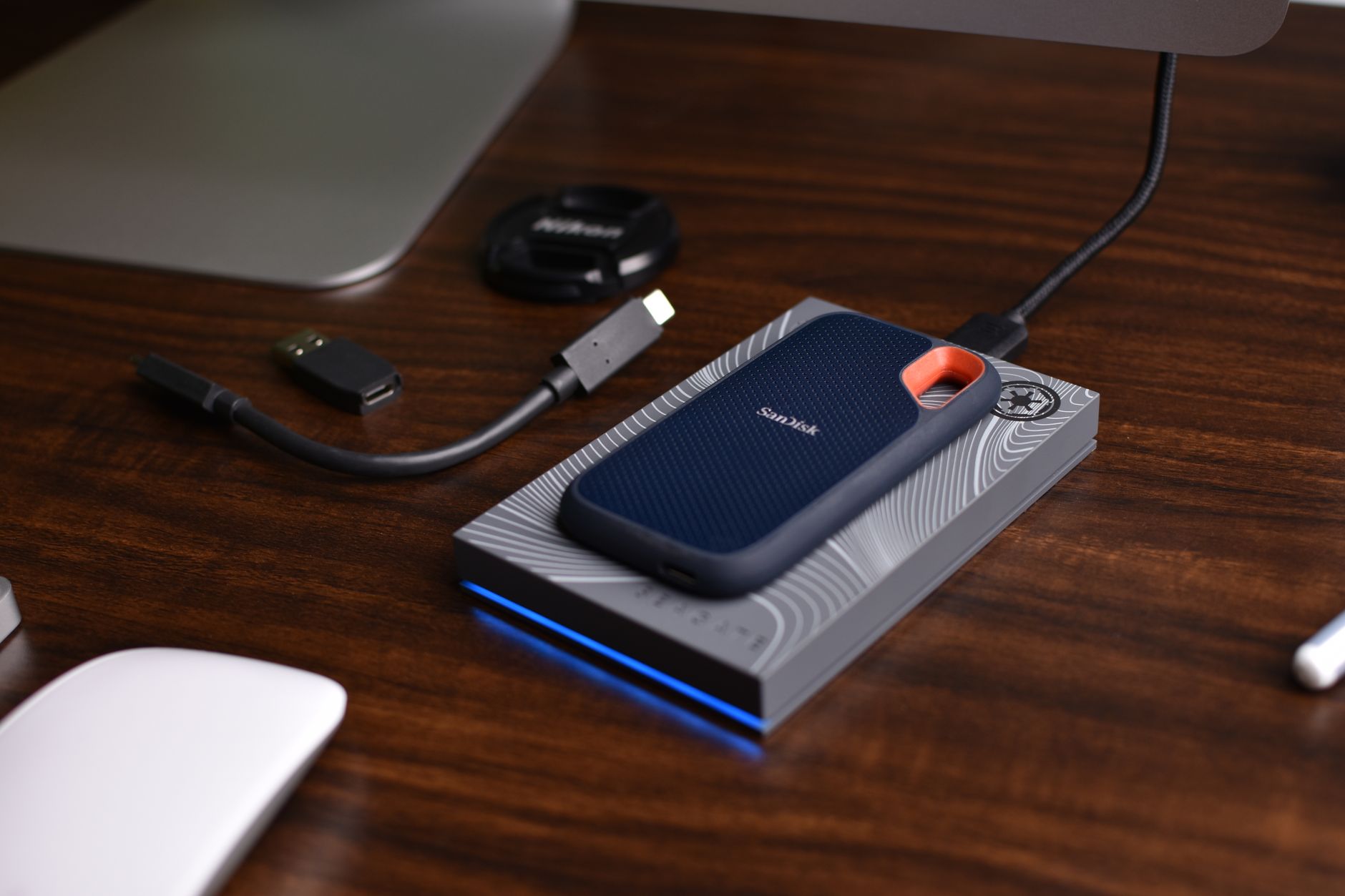 A laptop connected to an external drive for file backup and storage